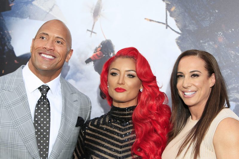 2015-05-26 23:26:02 epa04769651 US actor/cast member Dwayne Johnson (L) arrives with US actress and wrestler Eva Marie (C) and his ex wife Dany Garcia (R) at the premiere of 'San Andreas' at TCL Chinese Theatre IMAX in Hollywood, Los Angeles, California, USA, 26 May 2015. The movie opens in the US on 29 May. EPA/NINA PROMMER