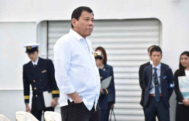 Philippine President Rodrigo Duterte inspects Japan's coast guard drills in Yokohama, Japan October 27, 2016. REUTERS/Kazuhiro Nogi/Pool