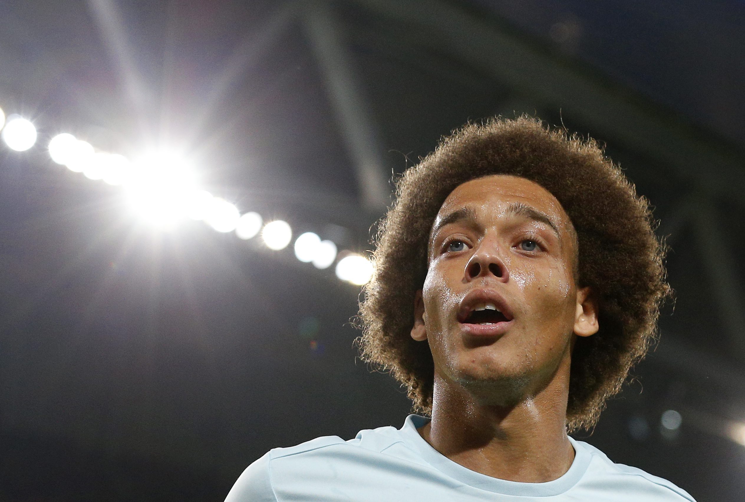 2016-07-01 21:03:51 epa05402295 Axel Witsel of Belgium reacts during the UEFA EURO 2016 quarter final match between Wales and Belgium at Stade Pierre Mauroy in Lille Metropole, France, 01 July 2016. (RESTRICTIONS APPLY: For editorial news reporting purposes only. Not used for commercial or marketing purposes without prior written approval of UEFA. Images must appear as still images and must not emulate match action video footage. Photographs published in online publications (whether via the Internet or otherwise) shall have an interval of at least 20 seconds between the posting.) EPA/LAURENT DUBRULE EDITORIAL USE ONLY