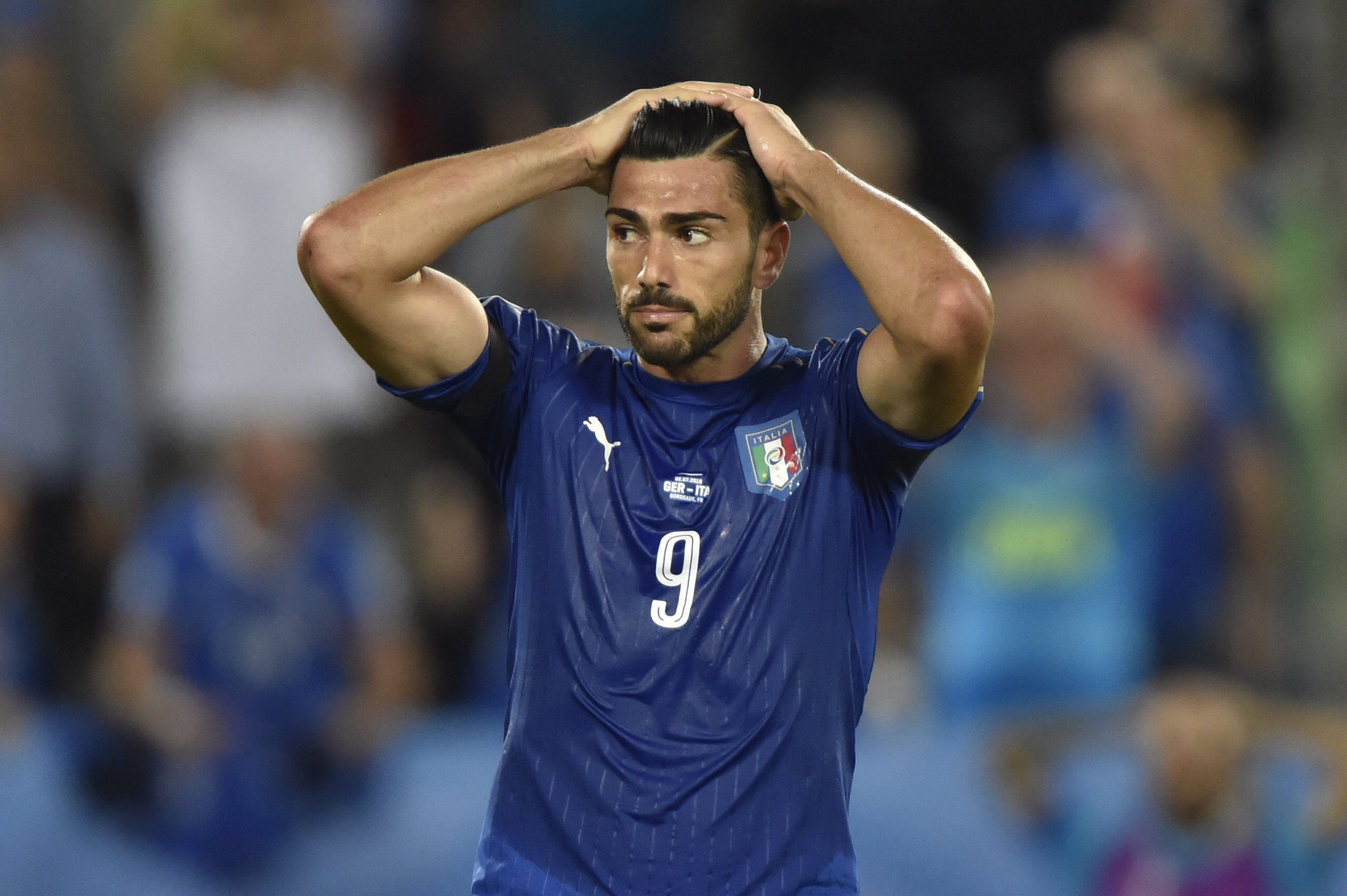 2016-07-02 19:36:30 epa05404535 Graziano Pelle of Italy reacts during the UEFA EURO 2016 quarter final match between Germany and Italy at Stade de Bordeaux in Bordeaux, France, 02 July 2016. (RESTRICTIONS APPLY: For editorial news reporting purposes only. Not used for commercial or marketing purposes without prior written approval of UEFA. Images must appear as still images and must not emulate match action video footage. Photographs published in online publications (whether via the Internet or otherwise) shall have an interval of at least 20 seconds between the posting.) EPA/Tibor Illyes HUNGARY OUT EDITORIAL USE ONLY