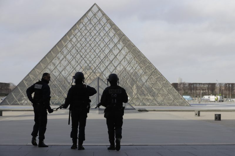French police secure the site near the Louvre Pyramid in Paris, France, February 3, 2017 after a French soldier shot and wounded a man armed with a knife after he tried to enter the Louvre museum in central Paris carrying a suitcase, police sources said.