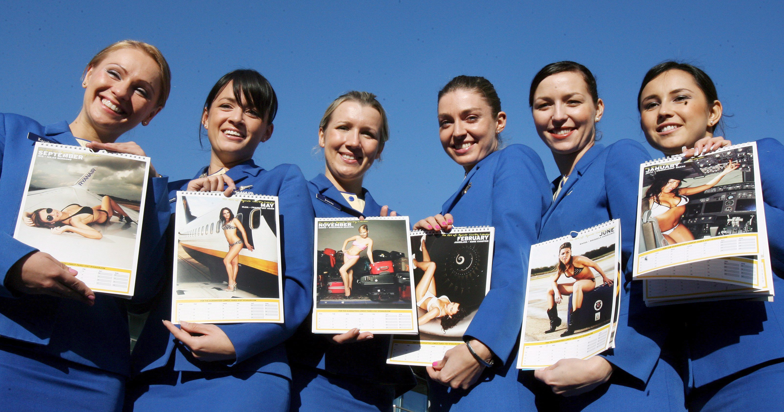 2007-11-15 14:07:51 epa01173777 Ryanair cabin crew calendar girls hold the 2008 Ryanair charity calendar in London, Britain, 15 November 2007. Ryanair, Europe's largest low fares airline, unveiled the new Ryanair charity calendar with their own cabin crew staff stripping down to their bare essentials. Proceeds from the calendar will go toward children with special needs. EPA/ANDY RAIN