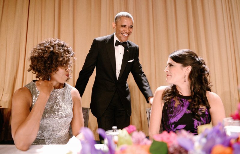 2015-04-25 19:15:36 epa04720898 US President Barack Obama (C) reacts as he is flanked by First Lady Michelle Obama (L) and Saturday Night Live's US comedian Cecily Strong (R) during the annual White House Correspondent's Association Gala at the Washington Hilton hotel, in Washington, DC, 25 April 2015. The dinner is an annual event attended by journalists, politicians and celebrities. EPA/OLIVIER DOULIERY/POOL