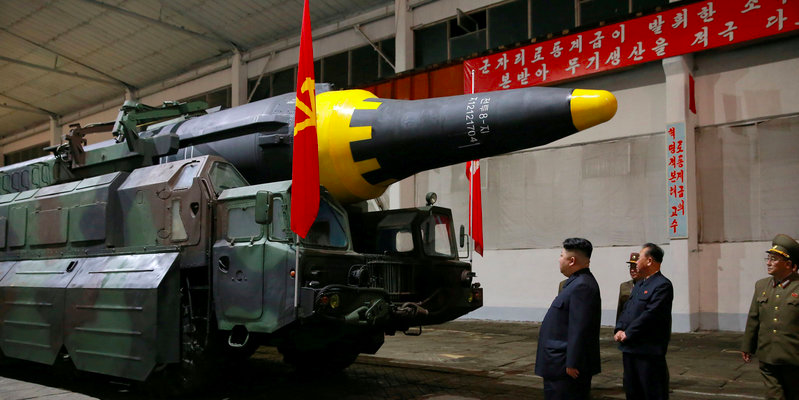FILE PHOTO - North Korean leader Kim Jong Un inspects the long-range strategic ballistic rocket Hwasong-12 (Mars-12) in this undated photo released by North Korea's Korean Central News Agency (KCNA) on May 15, 2017. KCNA via REUTERS/File photo