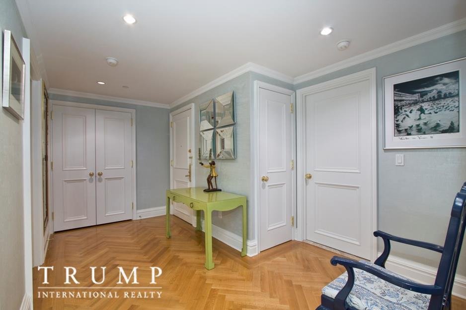 a-wide-foyer-offers-a-grand-entrance-to-the-1500-square-foot-condo