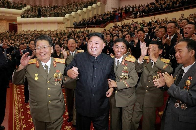 FILE PHOTO: North Korean leader Kim Jong Un reacts during a celebration for nuclear scientists and engineers who contributed to a hydrogen bomb test, in this undated photo released by North Korea's Korean Central News Agency (KCNA) in Pyongyang on September 10, 2017. KCNA via REUTERS  