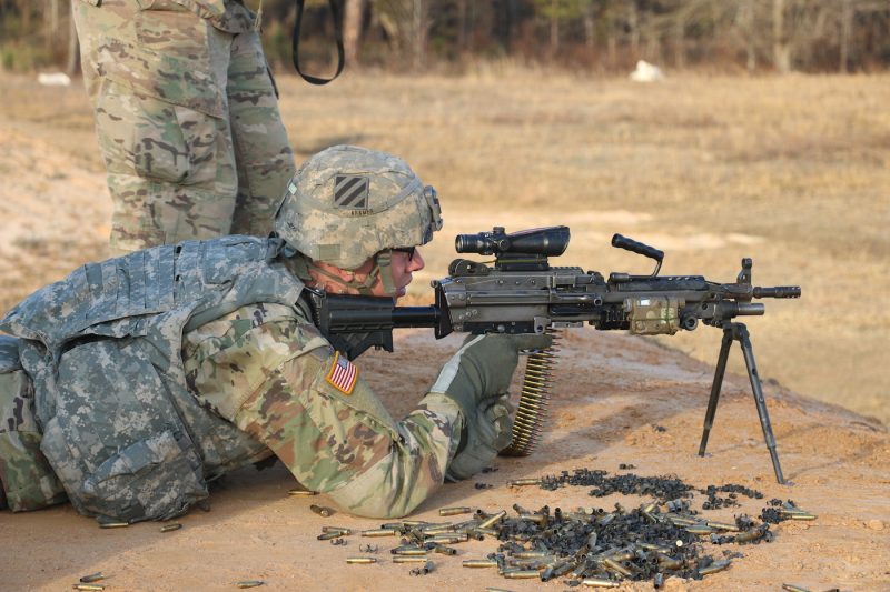 US Army soldier M249 automatic weapon rifle machine gun