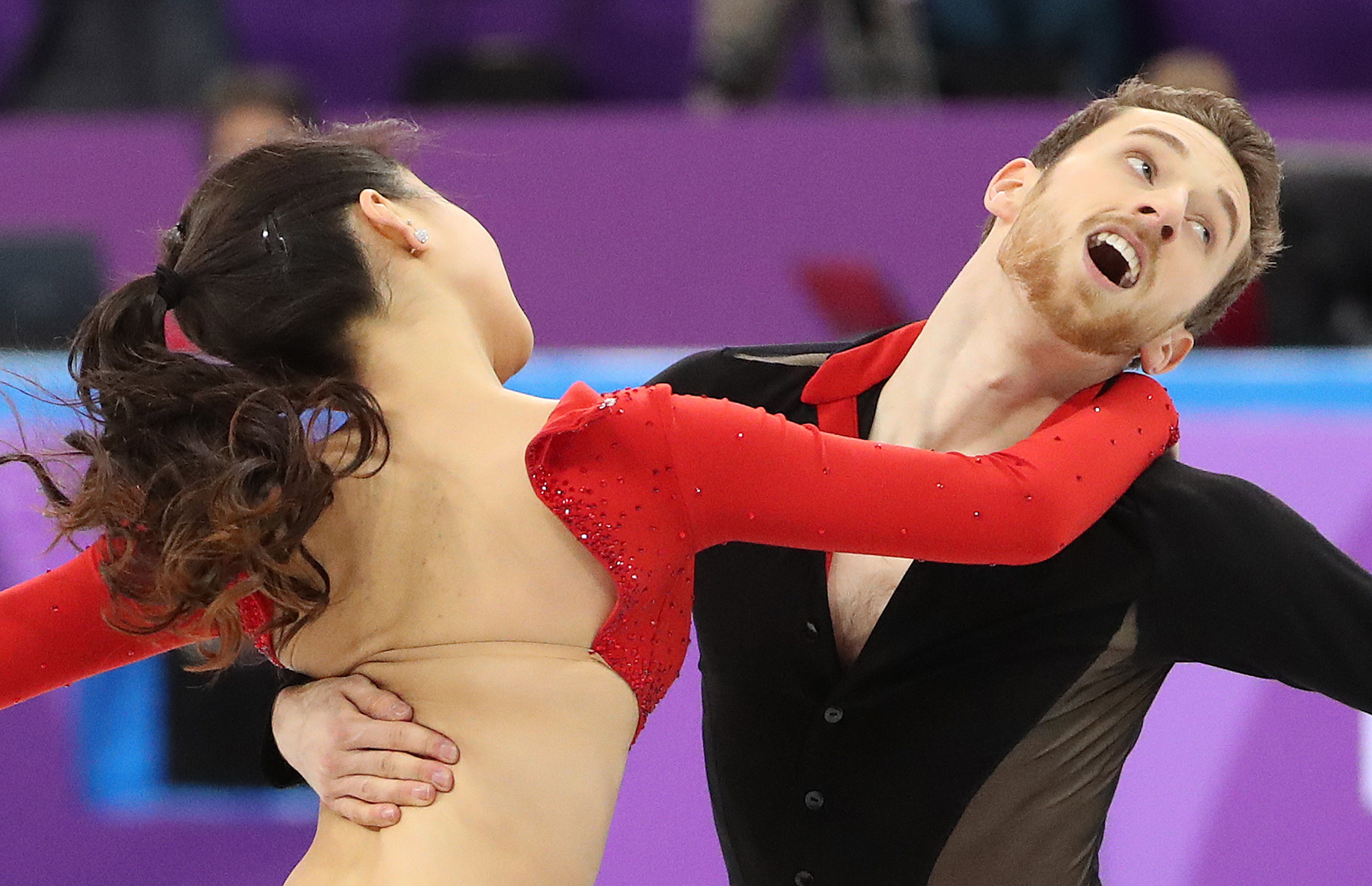 2018-02-11 10:09:10 epa06514005 Yura Min has a clasp in her costume come undone (C) as she and Alexander Gamelin of South Korea compete during the Ice Dance Short Dance of the Figure Skating Team Event competition at the Gangneung Ice Arena during the PyeongChang 2018 Olympic Games, South Korea, 11 February 2018. EPA/TATYANA ZENKOVICH