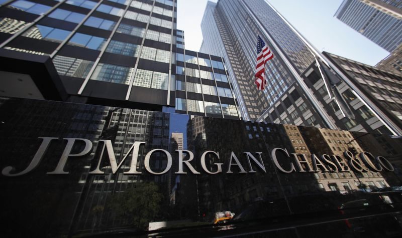A sign outside the headquarters of JP Morgan Chase & Co in New York, September 19, 2013. JPMorgan Chase & Co will pay $920 million in penalties in two countries to settle some of its potential liabilities from its 