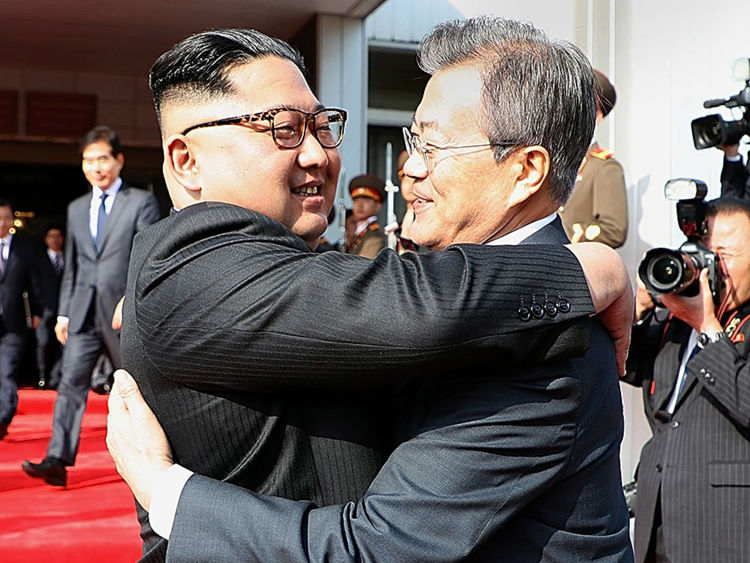 Kim Jong Un hugs Moon Jae-In