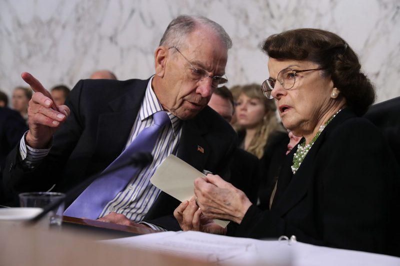 WASHINGTON, DC - SEPTEMBER 06: Senate Judiciary Committee Chairman Charles Grassley (R-IA) (L) talks with ranking member Sen. Dianne Feinstein (D-CA) during the thrid day of Supreme Court nominee Judge Brett Kavanaugh's confirmation hearing in the Hart Senate Office Building on Capitol Hill September 6, 2018 in Washington, DC. Kavanaugh was nominated by President Donald Trump to fill the vacancy on the court left by retiring Associate Justice Anthony Kennedy. (Photo by Chip Somodevilla/Getty Images)