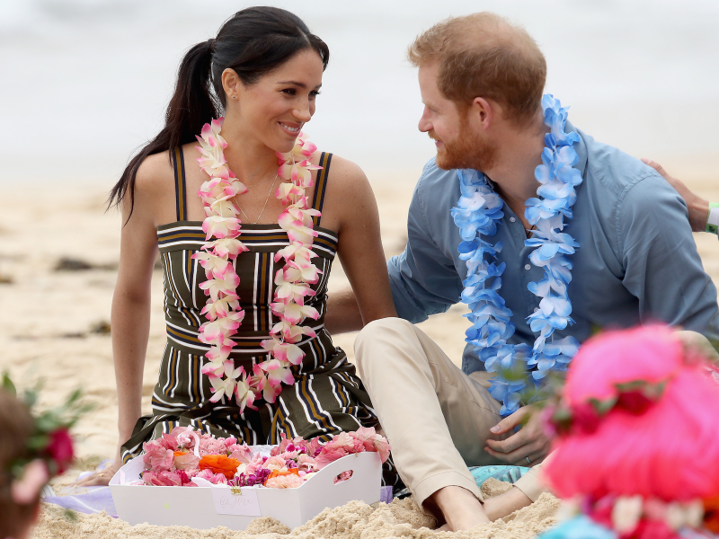 Prince Harry, Duke of Sussex and Meghan, Duchess of Sussex talk to members of OneWave, an awareness group for mental health and wellbeing at South Bondi Beach on October 19, 2018 in Sydney, Australia. The Duke and Duchess of Sussex are on their official 16-day Autumn tour visiting cities in Australia, Fiji, Tonga and New Zealand. (Photo by Chris Jackson - Pool/Getty Images)