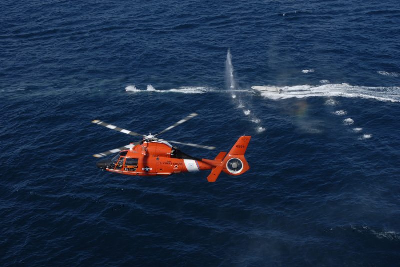 US Coast Guard helicopter HITRON Helicopter Interdiction Tactical Squadron warning shots