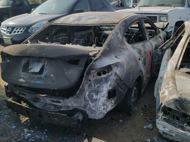 paradise camp fire burned car