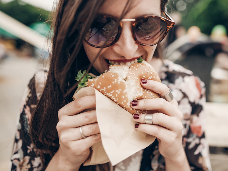 girl eating burger cheeseburger