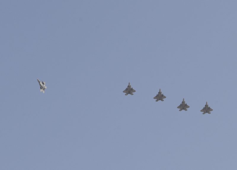 F-22s flying in formation in the Middle East