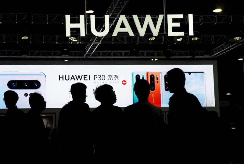 FILE PHOTO: A Huawei company logo is seen at CES (Consumer Electronics Show) Asia 2019 in Shanghai, China June 11, 2019. REUTERS/Aly Song