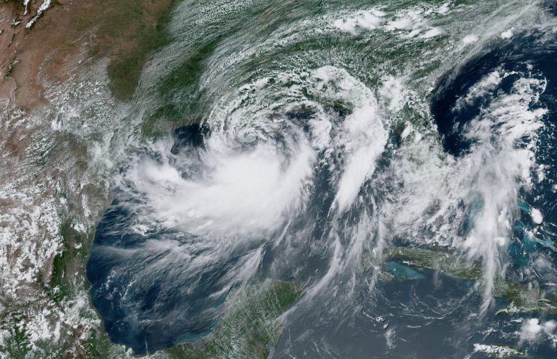 Tropical Storm Barry approaches the coast of Louisiana, U.S. from the Gulf of Mexico in this July 12, 2019 satellite handout photo.  NOAA/Handout via REUTERS 