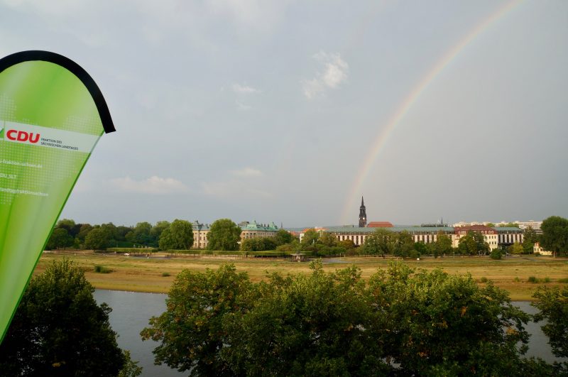 A rainbow forms over Dresden as polls close on Sunday evening.