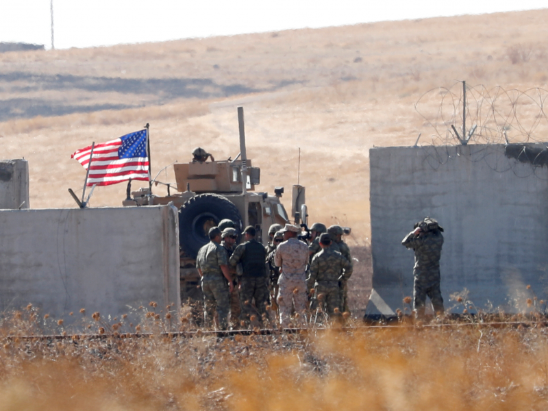FILE PHOTO: Turkish and U.S. troops meet on the Turkish-Syrian border for a joint U.S.-Turkey patrol in northern Syria, as it is pictured from near the Turkish town of Akcakale, Turkey, September 8, 2019. REUTERS/Murad Sezer/File Photo