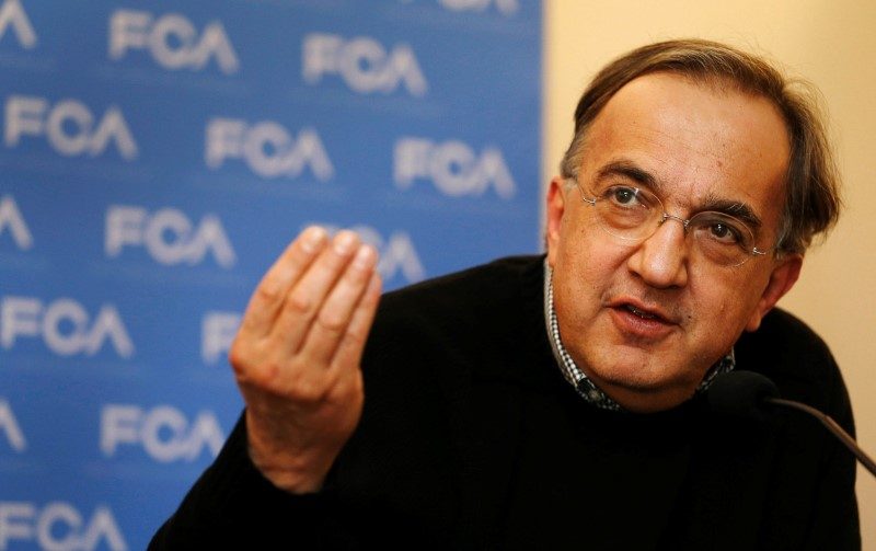 FILE PHOTO: Fiat Chrysler CEO Sergio Marchionne answers questions from the media during the FCA Investors Day at the Chrysler World Headquarters in Auburn Hills, Michigan, U.S., on May 6, 2014. REUTERS/Rebecca Cook/File Photo