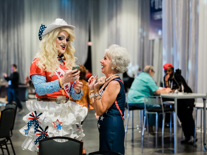 Lady MAGA with woman at Politicon