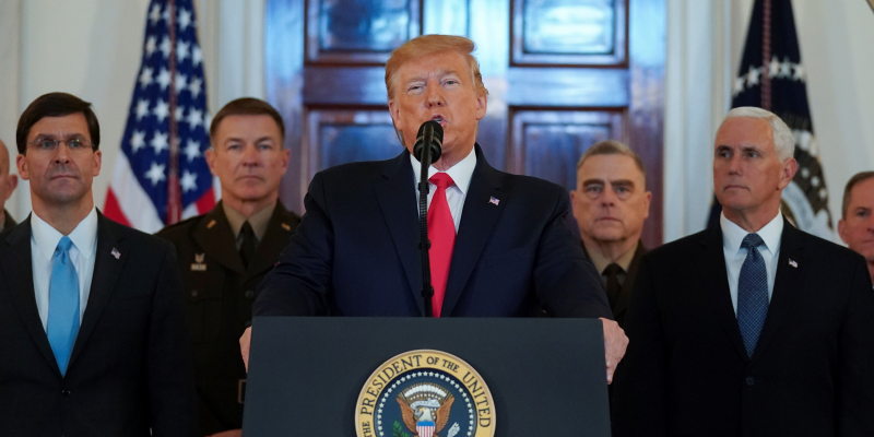 U.S. President Donald Trump delivers a statement about Iran flanked by U.S. Secretary of Defense Mark Esper, Vice President Mike Pence and military leaders in the Grand Foyer at the White House in Washington, U.S., January 8, 2020. REUTERS/Kevin Lamarque