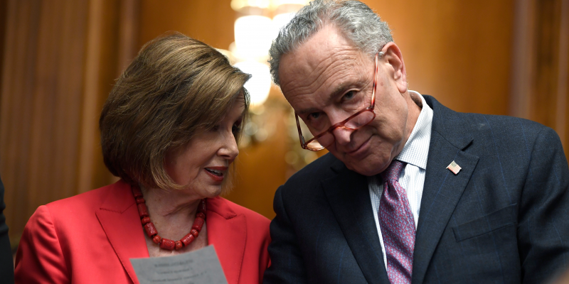 House Speaker Nancy Pelosi of Calif., left, and Senate Minority Leader Sen. Chuck Schumer of N.Y., right, talk as they wait to speak at an event on Capitol Hill in Washington, Tuesday, Nov. 12, 2019, regarding the earlier oral arguments before the Supreme Court in the case of President Trump's decision to end the Obama-era, Deferred Action for Childhood Arrivals (DACA), program. (AP Photo/Susan Walsh)
