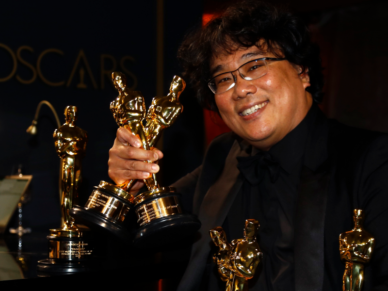 FILE PHOTO: Bong Joon Ho poses with the Oscars for 