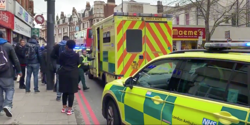 Ambulances are seen in Streatham, London, on Sunday.