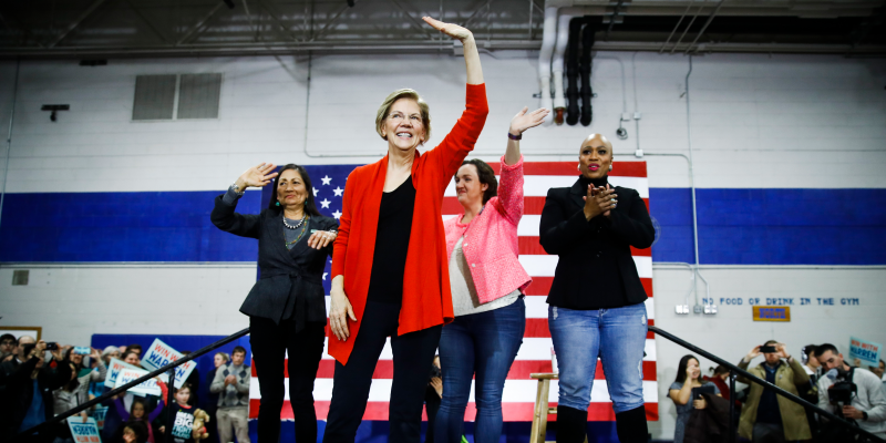 Democratic presidential candidate Sen. Elizabeth Warren, D-Mass., second left, is joined on stage by Rep. Deb Haaland, D-N.M., Rep. Katie Porter, D-Calif., and Rep. Ayanna Pressley, D-Mass., during a campaign event at Rundlett Middle School, Sunday, Feb. 9, 2020, in Concord, N.H. (AP Photo/Matt Rourke)
