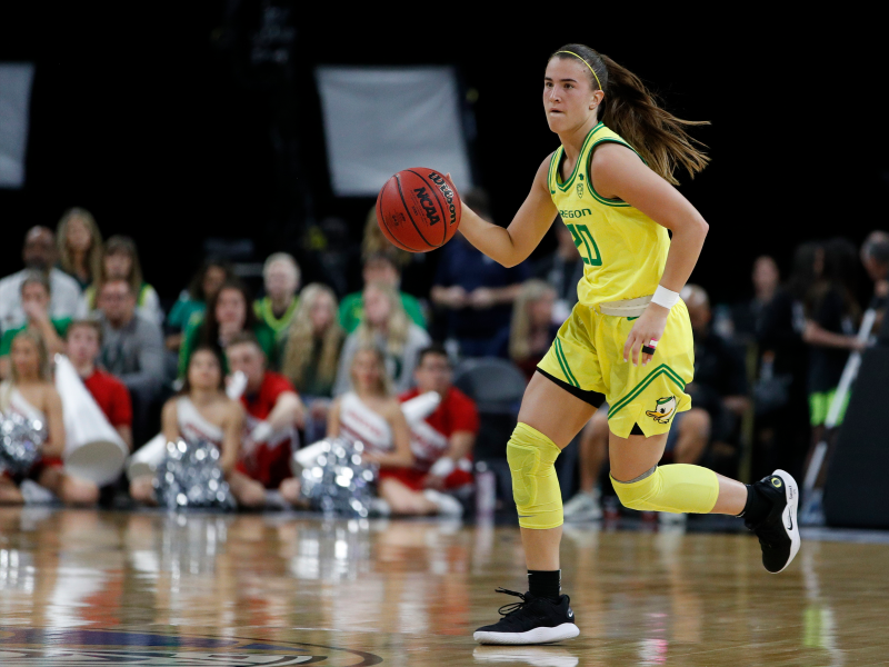 FILE - In this March 6, 2020, file photo, Oregon's Sabrina Ionescu (20) plays against Utah in an NCAA college basketball game in the quarterfinal round of the Pac-12 women's tournament in Las Vegas. The Associated Press had a panel of WNBA coaches and general managers hold a mock draft. (AP Photo/John Locher, File)
