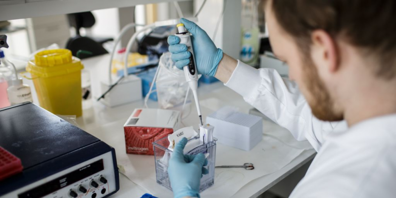 GettyImages  A researcher works on a vaccin against the new coronavirus COVID-19 at the Copenhagen's University research lab in Copenhagen, Denmark, on March 23, 2020.