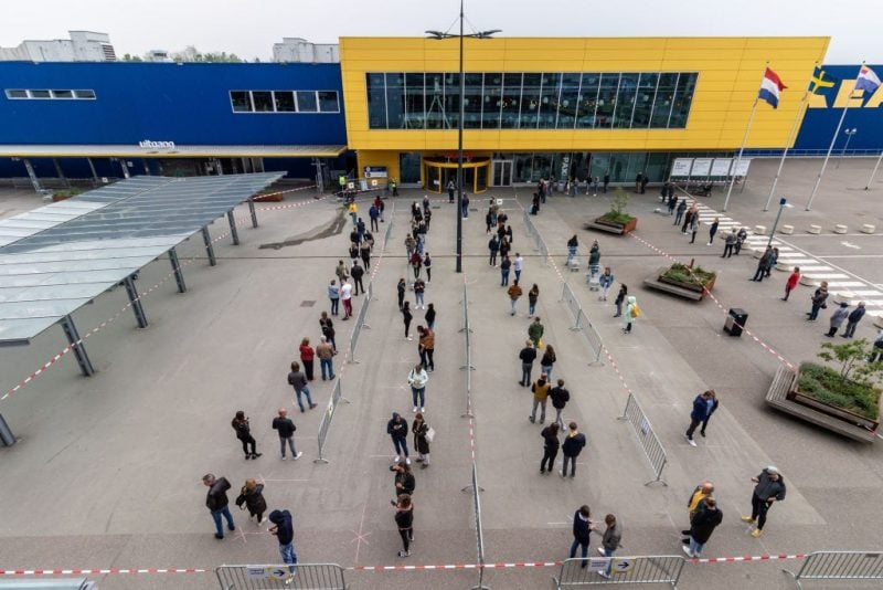 Long lines of customers wait to go into an IKEA in Duiven, Netherlands, on April 28, 2020.