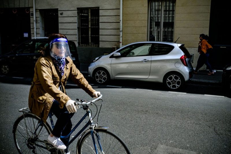 Woman biking in Paris - May 2020