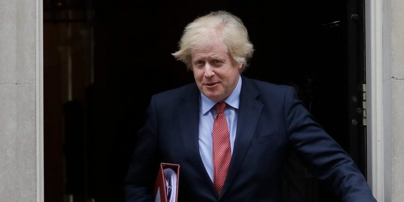 Britain's Prime Minister Boris Johnson leaves 10 Downing Street to attend the weekly session of PMQs in Parliament in London, Wednesday, June 10, 2020. (AP Photo/Kirsty Wigglesworth)