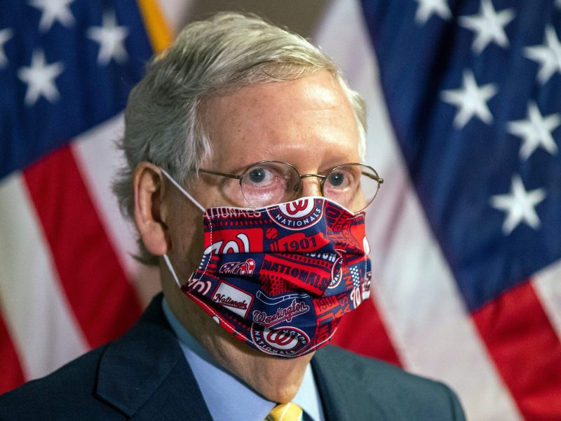 FILE - In this June 30, 2020, file photo Senate Majority Leader Mitch McConnell, R-Ky., listens to questions during a news conference following a GOP policy meeting on Capitol Hill in Washington. McConnell is emerging the GOP's mask spokesman, the highest ranking Republican in Congress proselytizing about the importance of wearing a face covering during the pandemic. (AP Photo/Manuel Balce Ceneta, File)