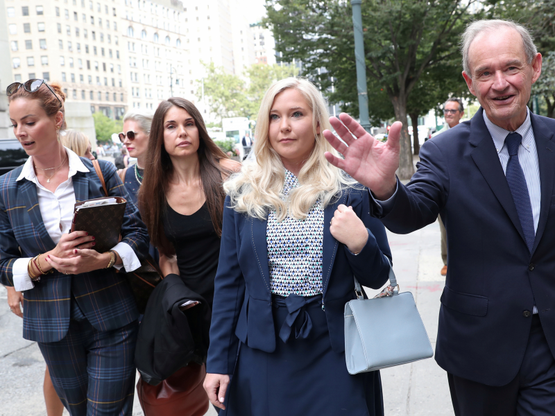 Lawyer David Boies arrives with his client Virginia Giuffre for hearing in the criminal case against Jeffrey Epstein, who died this month in what a New York City medical examiner ruled a suicide, at Federal Court in New York, U.S., August 27, 2019.