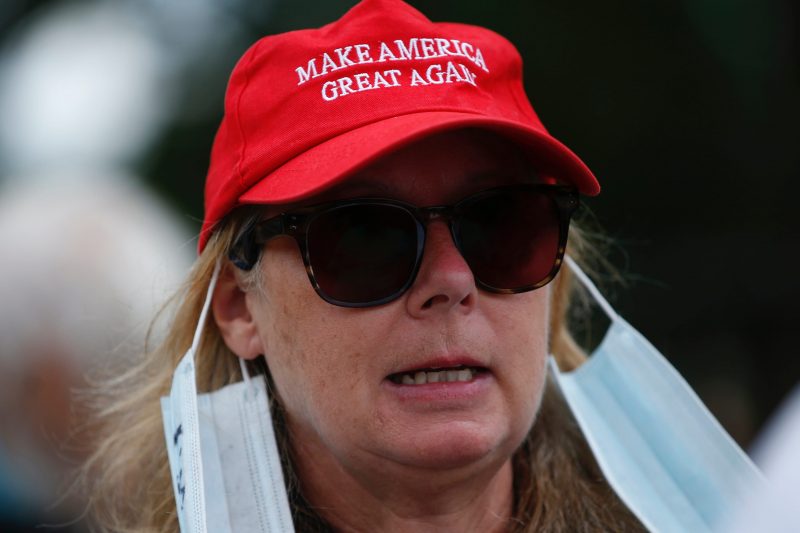 Mask protest MAGA hat 