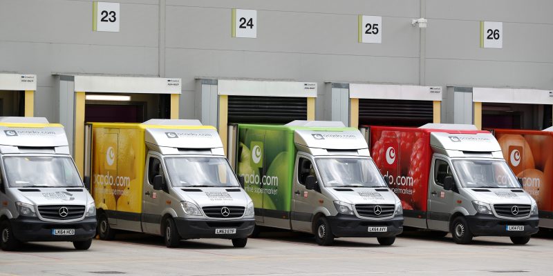 Delivery vans are lined up prior to dispatch at the Ocado CFC (Customer Fulfilment Centre) in Andover, Britain May 1, 2018. Picture taken May 1, 2018. REUTERS/Peter Nicholls
