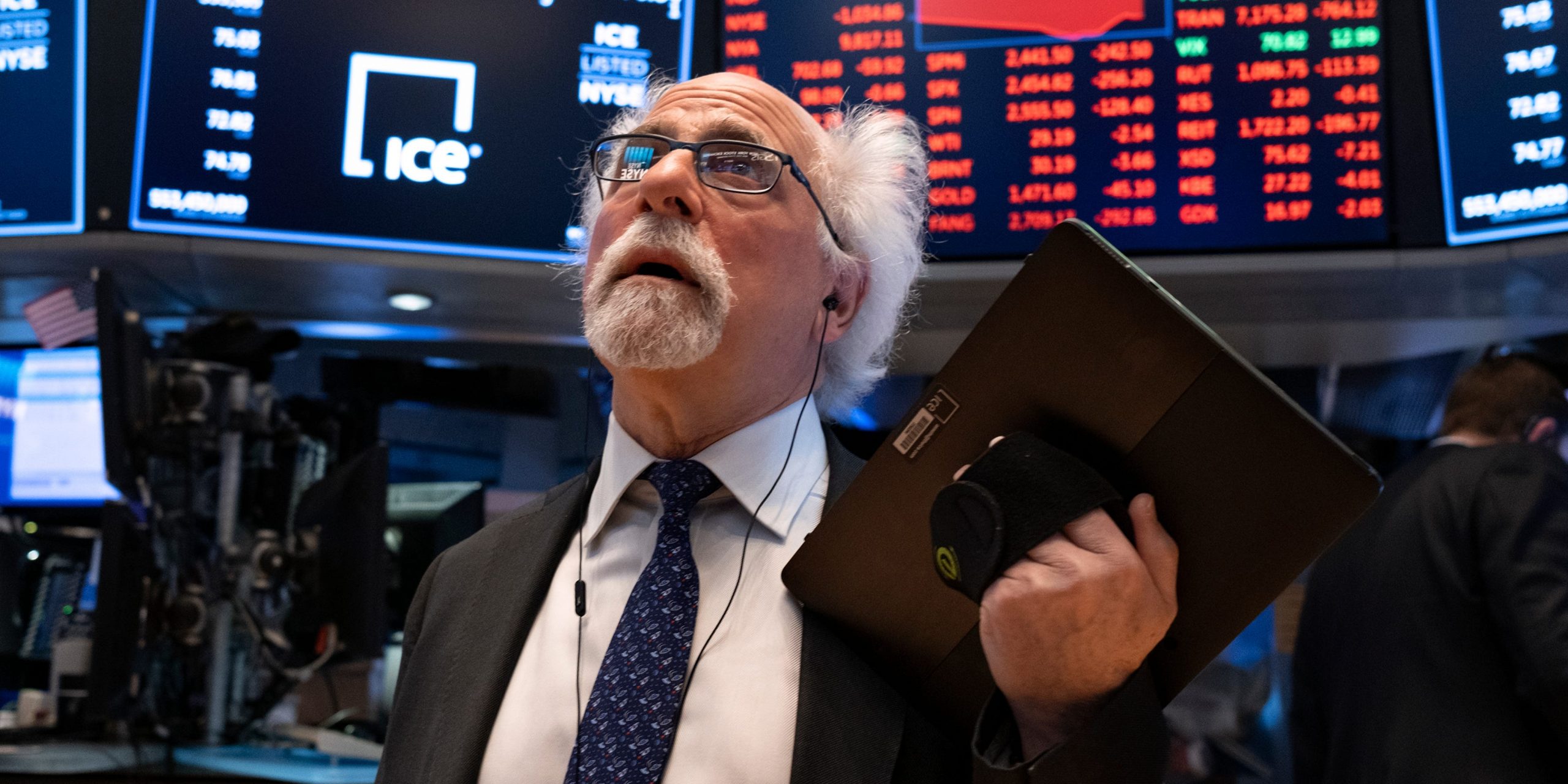 Trader Peter Tuchman works on the floor of the New York Stock Exchange Monday, March 16, 2020. (AP Photo/Craig Ruttle)