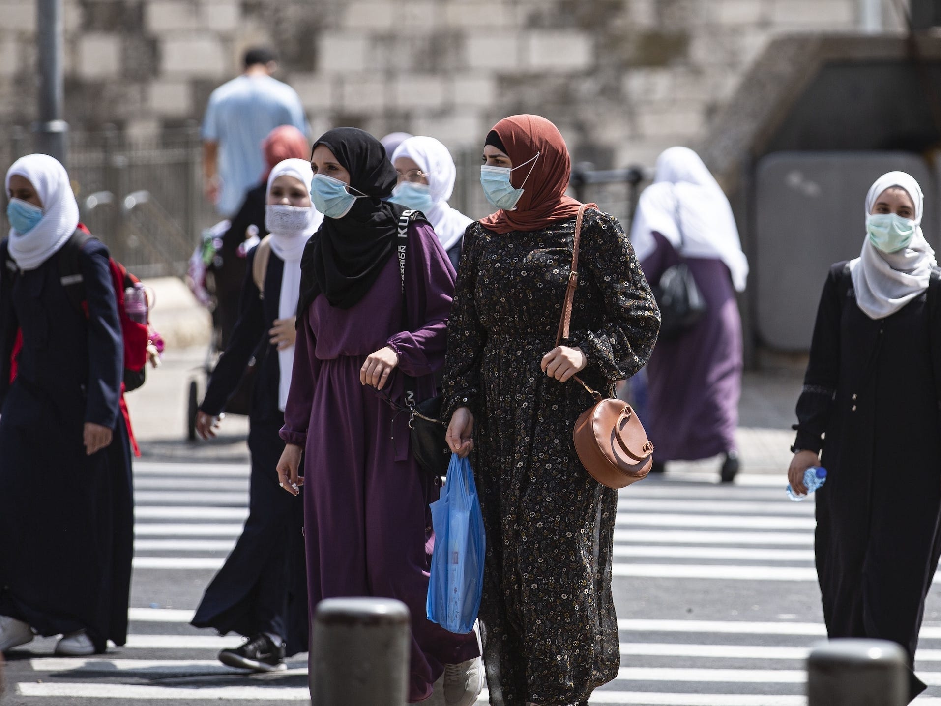 israel jerusalem women wearing masks