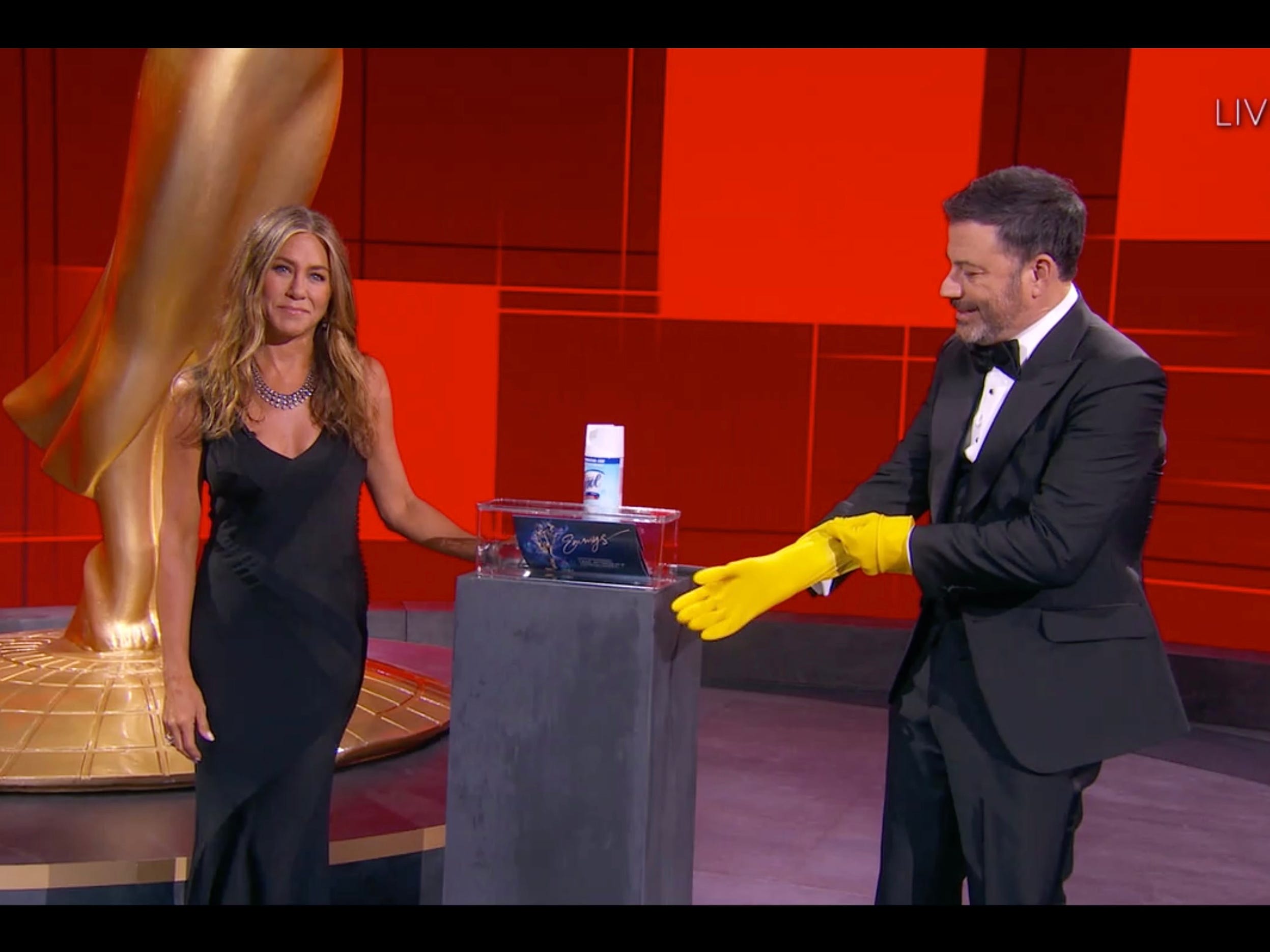 Jennifer Aniston presenting the award for outstanding lead actress in a comedy series alongside host Jimmy Kimmel.