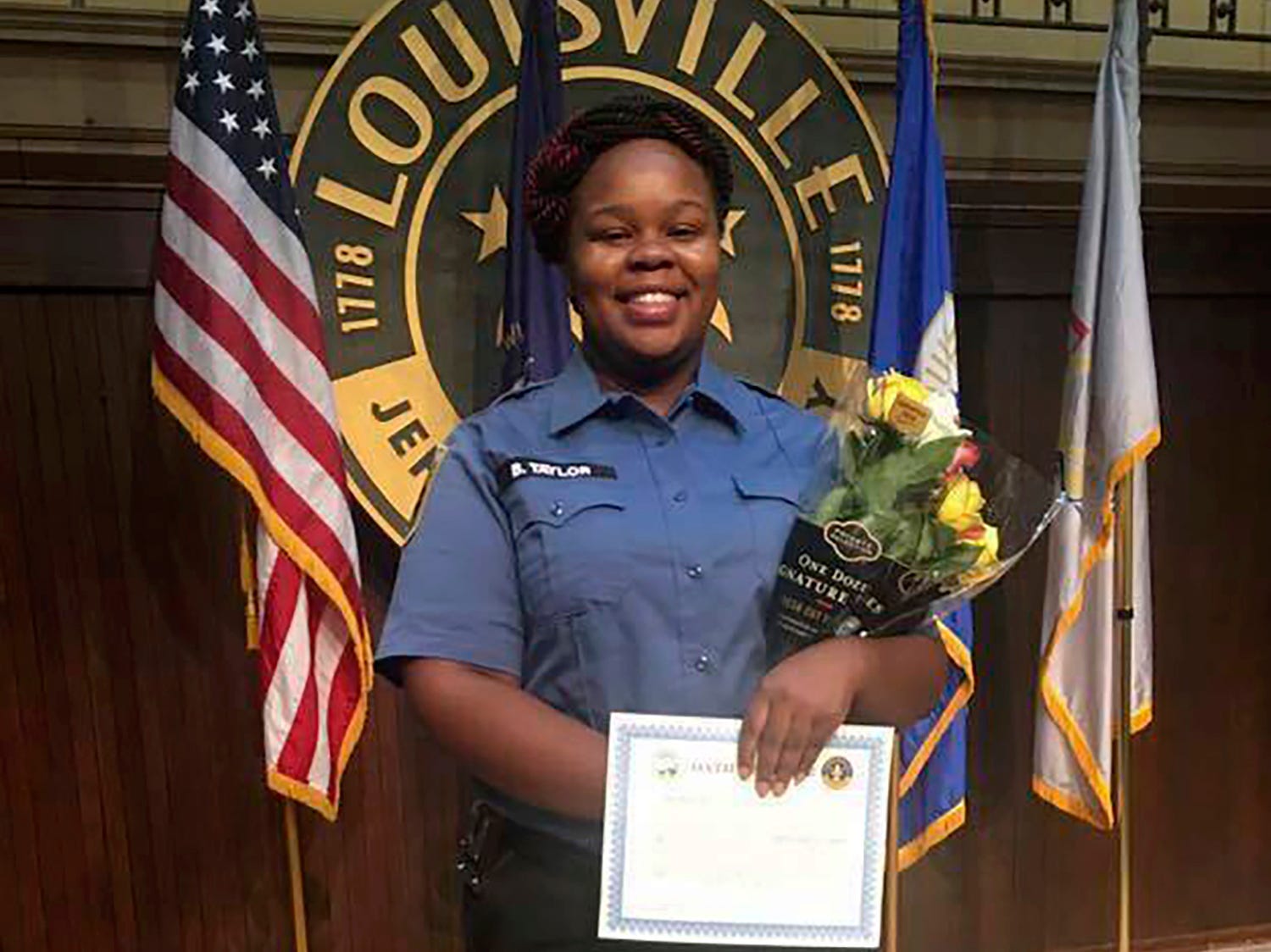 This undated photo provided by Taylor family attorney Sam Aguiar shows Breonna Taylor  in Louisville, Ky.  Three months after plainclothes detectives serving a warrant busted into Tylor's apartment on March 13, 2020, and shot the 26-year-old Black woman to death, only one of the three officers who opened fire has lost his job.  Calls for action against the officers have gotten louder during a national reckoning over racism and police brutality following George Floyd's death in Minneapolis.  (Photo provided by Taylor family attorney Sam Aguiar via AP)