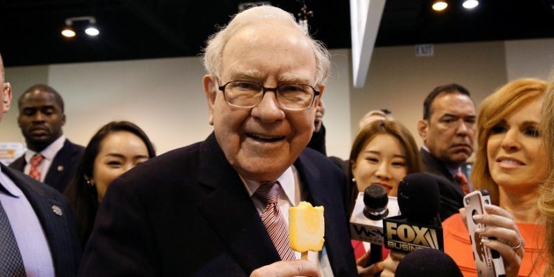 FILE PHOTO - Berkshire Hathaway chairman and CEO Warren Buffett enjoys an ice cream treat from Dairy Queen before the Berkshire Hathaway annual meeting in Omaha, Nebraska, U.S. May 6, 2017. REUTERS/Rick Wilking 