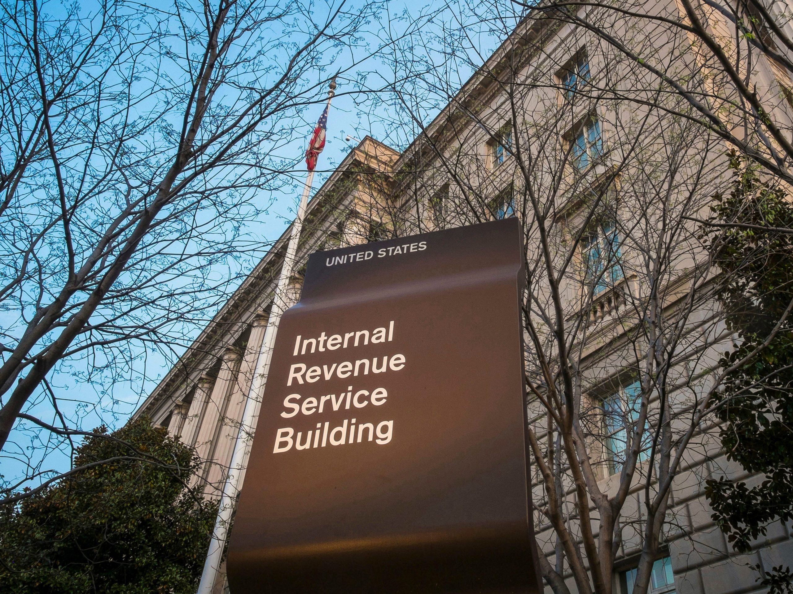 FILE - This April 13, 2014, file photo shows the Internal Revenue Service (IRS) headquarters building in Washington. The Treasury Department and the IRS are urging taxpayers who want to get their economic impact payments directly deposited to their bank accounts to enter their information online by Wednesday, May 11, 2020. The IRS said that people should use the “Get My Payment” tool on the IRS website by noon on Wednesday to provide their direct deposit information. (AP Photo/J. David Ake, File)