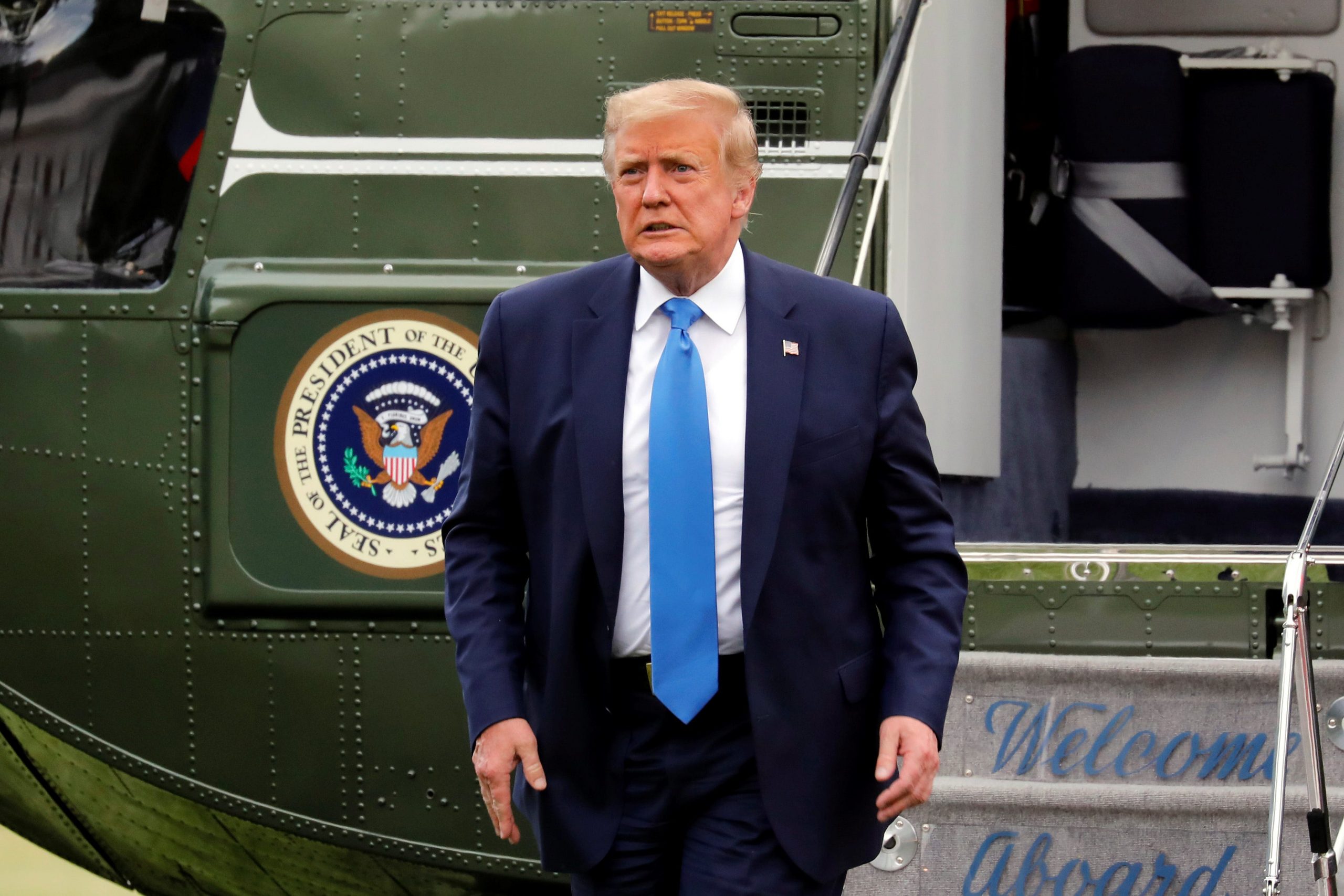 FILE PHOTO - U.S. President Donald Trump arrives on the South Lawn of the White House in Washington, U.S., from the Walter Reed National Military Medical Center, July 11, 2020. REUTERS/Yuri Gripas