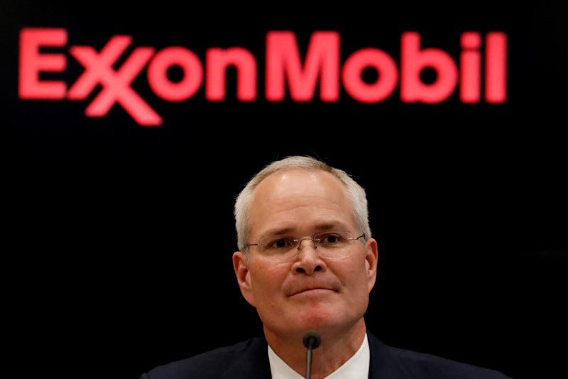 FILE PHOTO: Darren Woods, Chairman & CEO of Exxon Mobil Corporation attends a news conference at the New York Stock Exchange (NYSE) in New York, U.S., March 1, 2017. REUTERS/Brendan McDermid