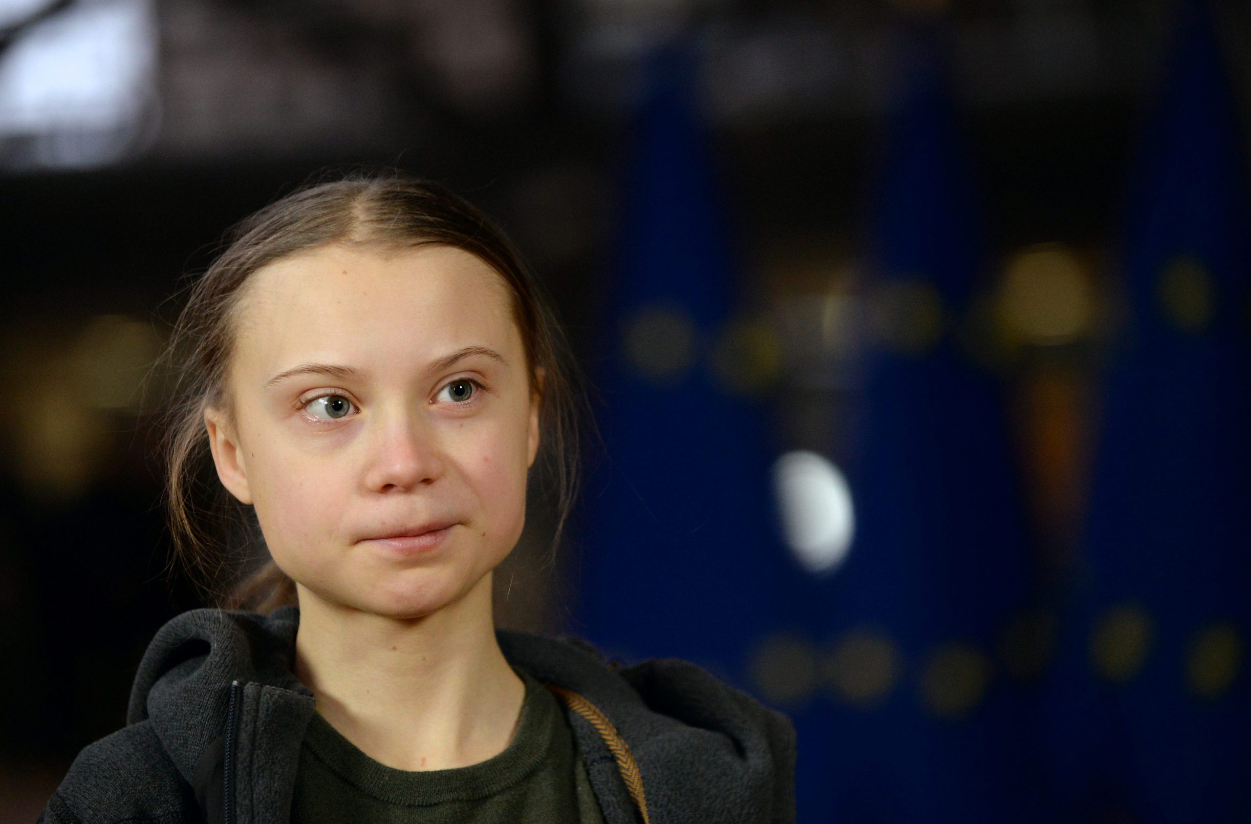 FILE PHOTO: Swedish climate activist Greta Thunberg talks to the media before meeting with EU environment ministers in Brussels, Belgium, March 5, 2020. REUTERS/Johanna Geron