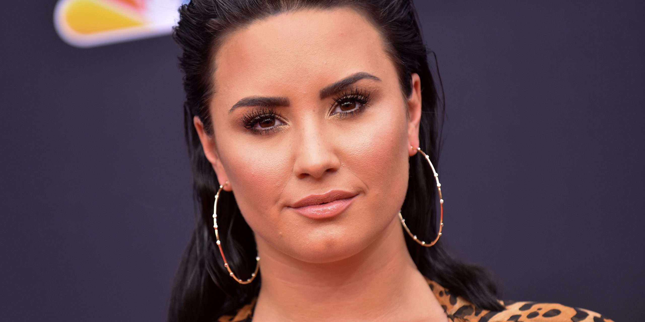 Demi Lovato and Tan France host Facebook Watch's "Coming Out 2020," which premiered on Friday.